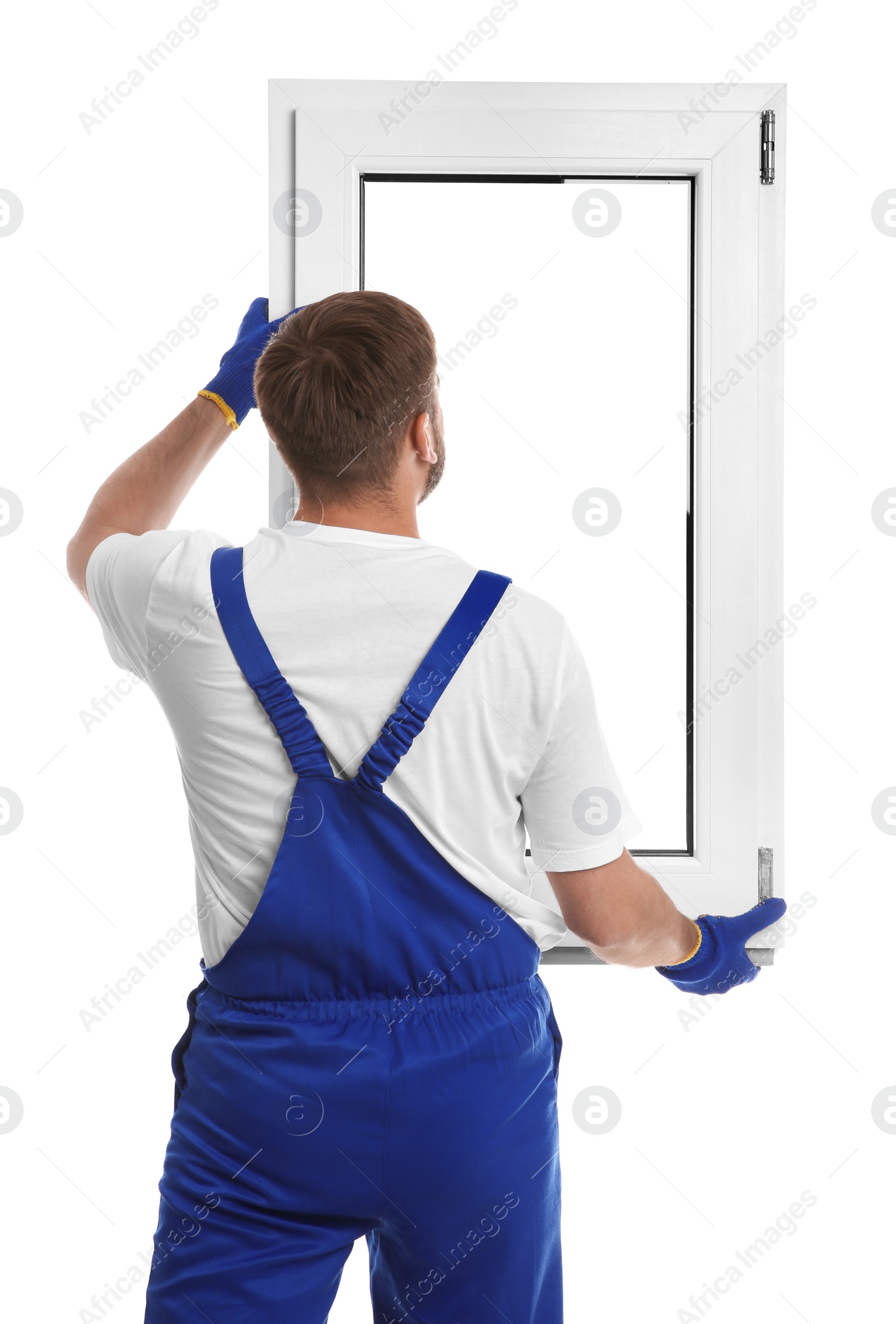 Photo of Worker with plastic window on white background, back view. Installation service