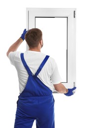 Photo of Worker with plastic window on white background, back view. Installation service