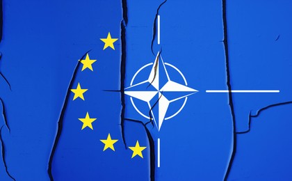 Flags of European Union and NATO on broken wall, banner design