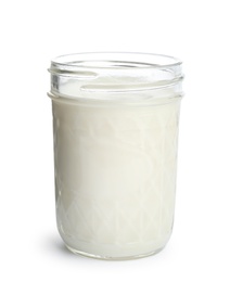 Jar with milk on white background