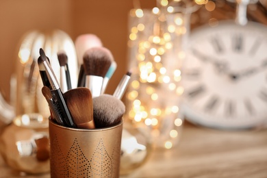 Holder with makeup brushes, closeup