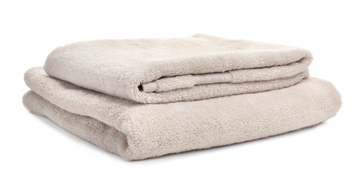 Photo of Clean soft towels on white background