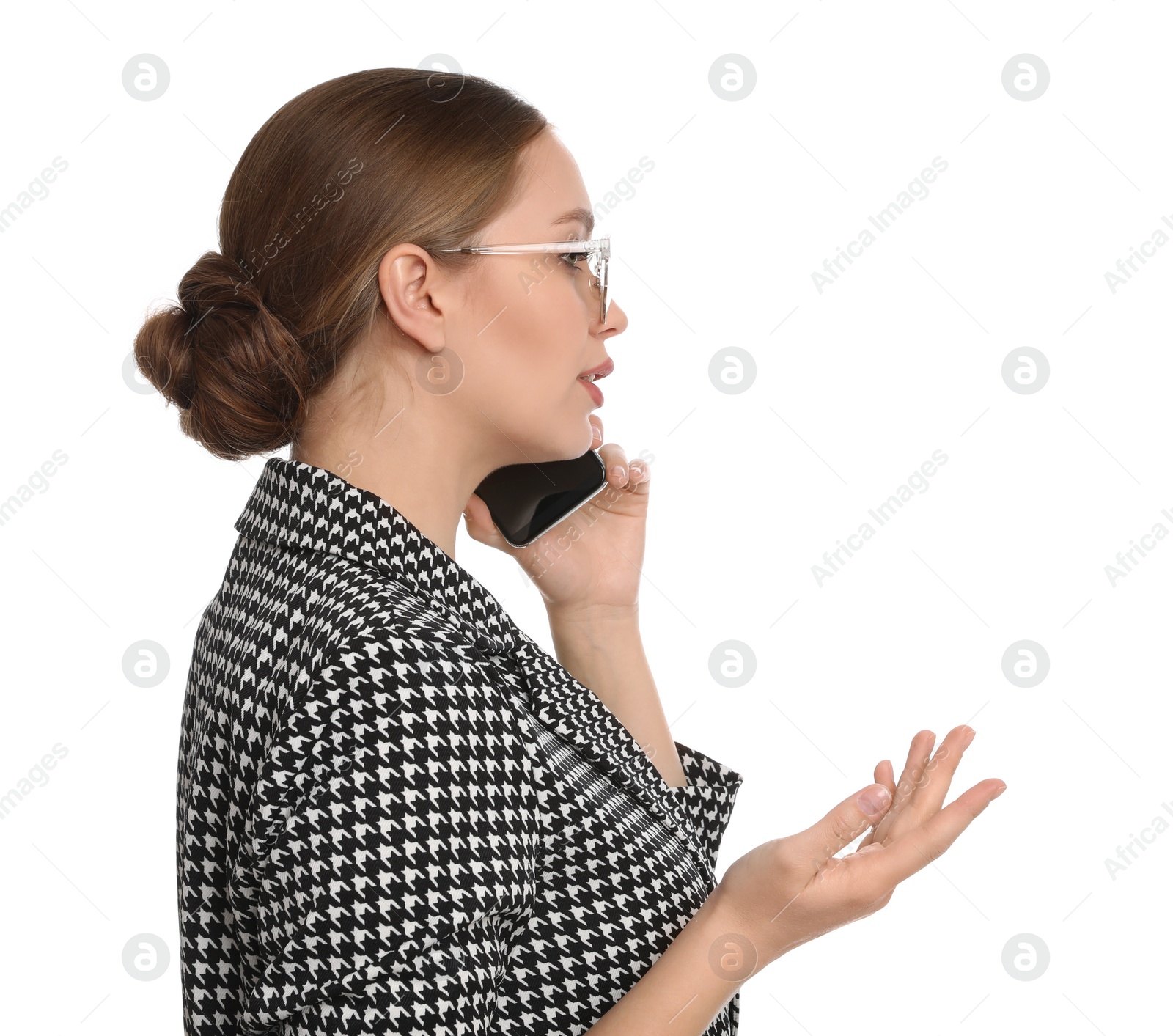 Photo of Young businesswoman talking on mobile phone against white background