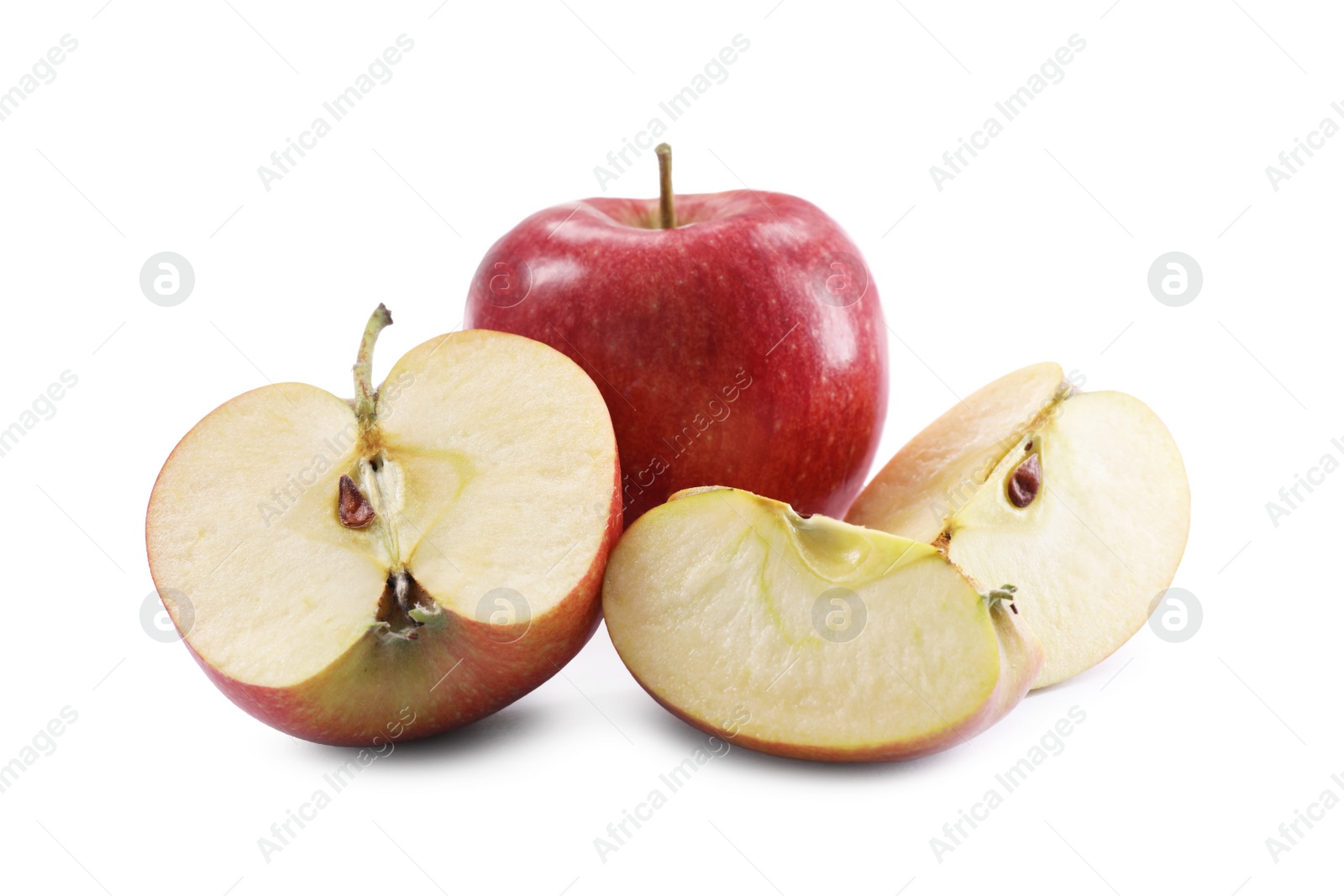 Photo of Whole and cut apples on white background