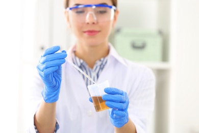 Female scientist working in laboratory. Research and analysis