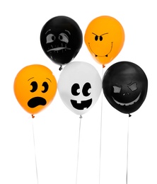Photo of Spooky balloons for Halloween party on white background