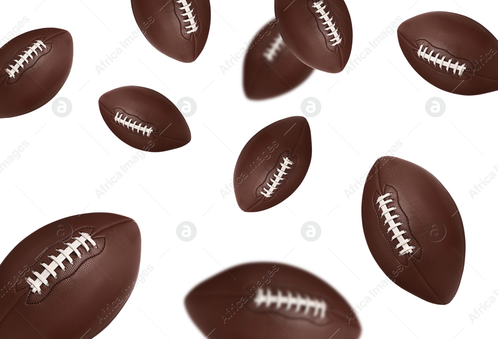 Image of Flying leather American football balls on white background