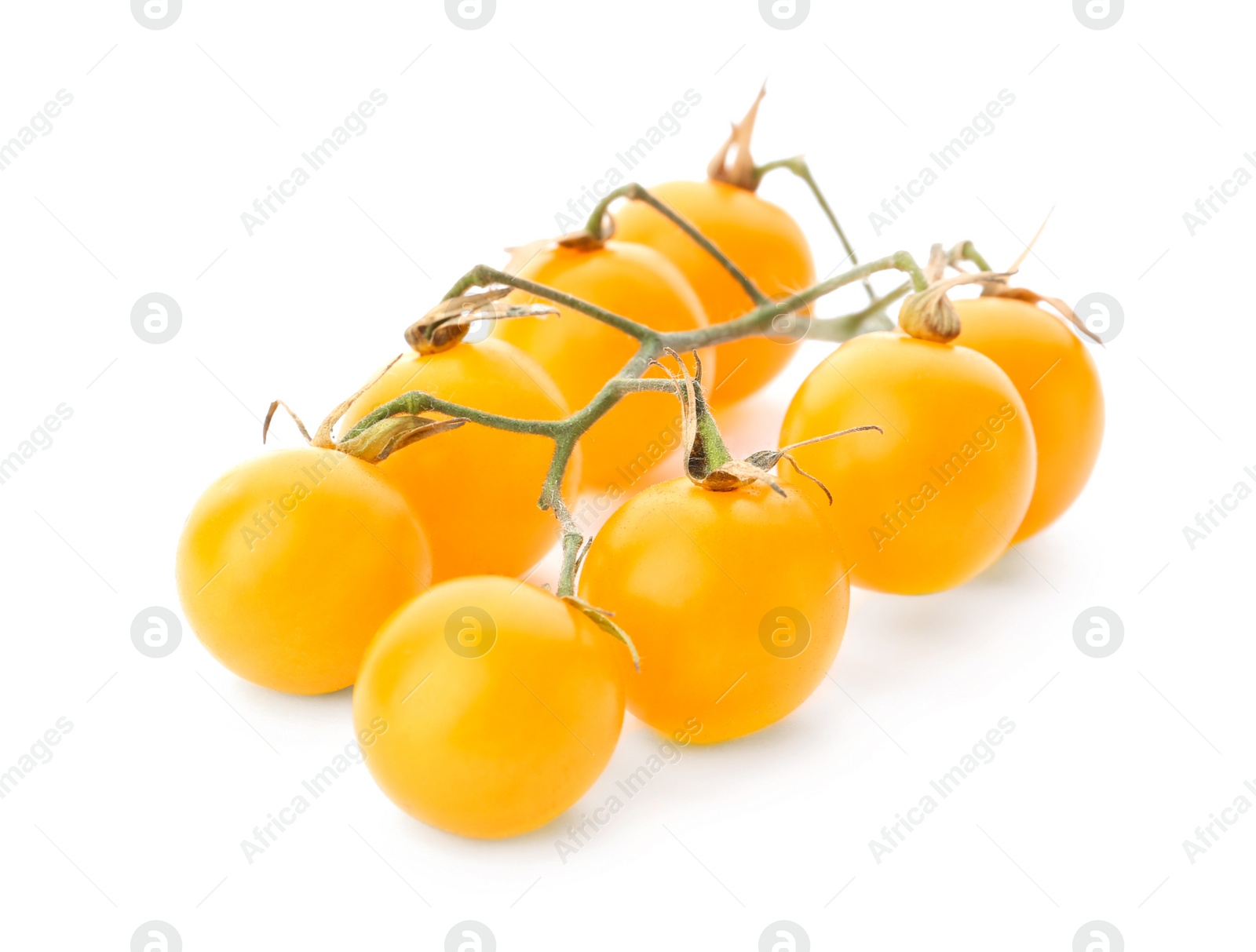 Photo of Branch of ripe yellow cherry tomatoes on white background