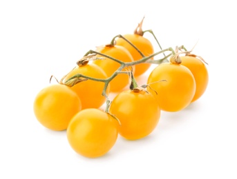 Photo of Branch of ripe yellow cherry tomatoes on white background