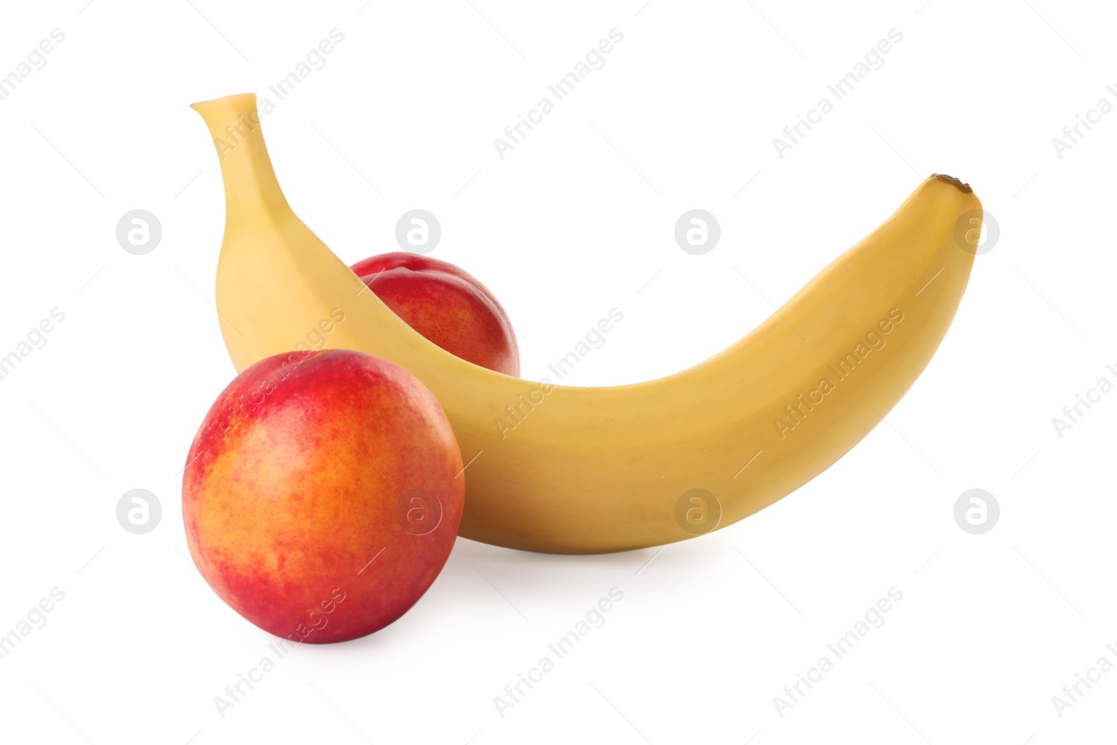 Photo of Banana and nectarines symbolizing male genitals on white background. Potency concept
