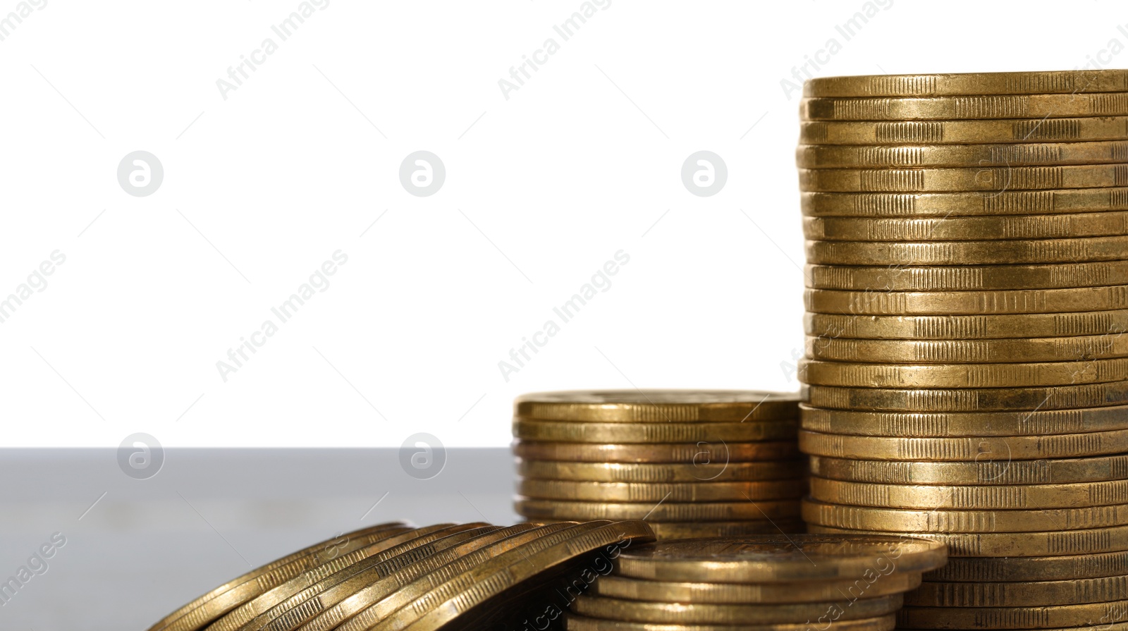 Photo of Stack of coins against light grey background, closeup . Space for text