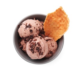 Photo of Tasty ice cream with chocolate chunks and piece of waffle cone in bowl isolated on white, top view