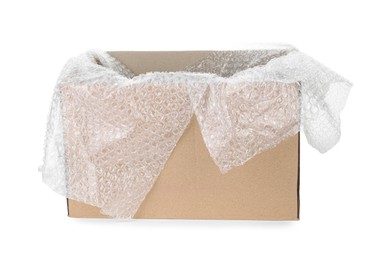 Photo of Transparent bubble wrap in cardboard box isolated on white