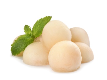 Photo of Melon balls and mint on white background