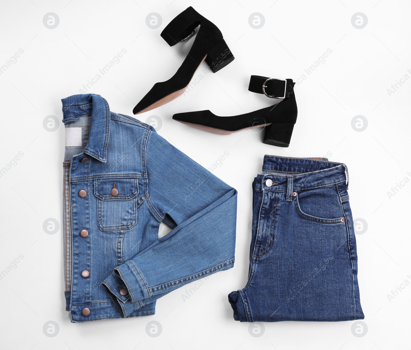 Photo of Flat lay composition with jeans, denim jacket and shoes on white background