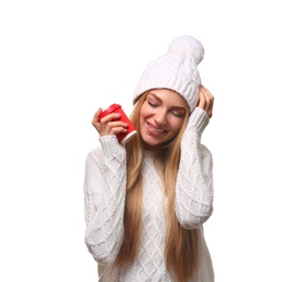 Photo of Portrait of young woman in stylish hat and sweater with coffee paper cup on white background. Winter atmosphere