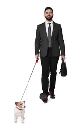 Image of Smiling businessman walking with dog on white background