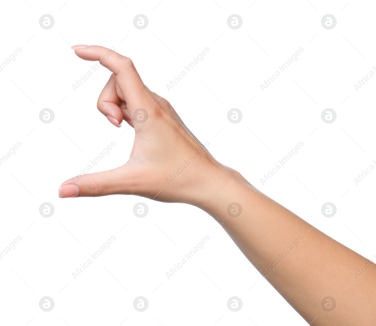 Photo of Woman holding something in fingers on white background