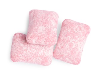 Photo of Tasty pink bubble gums isolated on white, top view