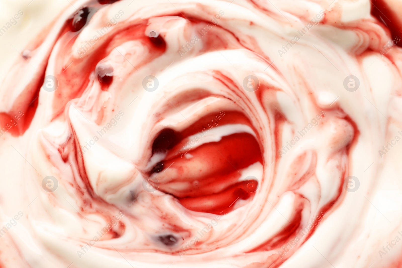 Photo of Tasty yoghurt with jam as background, top view