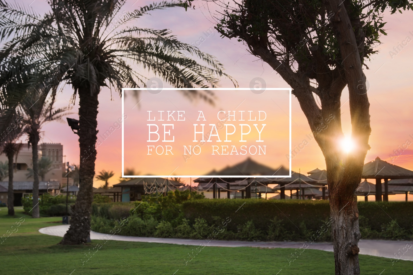 Image of Like A Child, Be Happy For No Reason. Inspirational quote saying that you don't need anything to feel happiness. Text against beautiful view of tropical resort at sunset