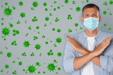Image of Stronger immunity - better disease resistance. Man in protective mask showing stop gesture surrounded by viruses on grey background