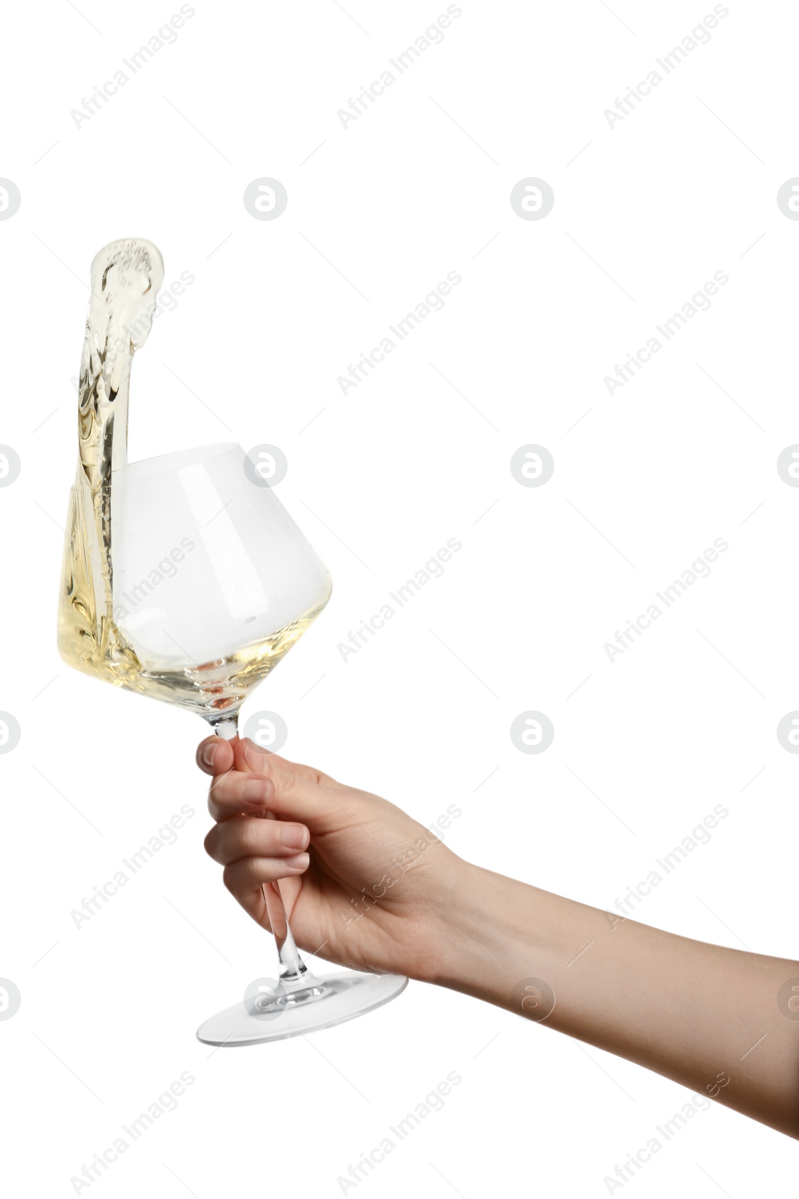 Photo of Woman with tasty aromatic wine splashing out of glass on white background, closeup