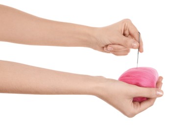 Photo of Woman needle felting from wool on white background, closeup