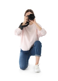 Photo of Professional photographer taking picture on white background