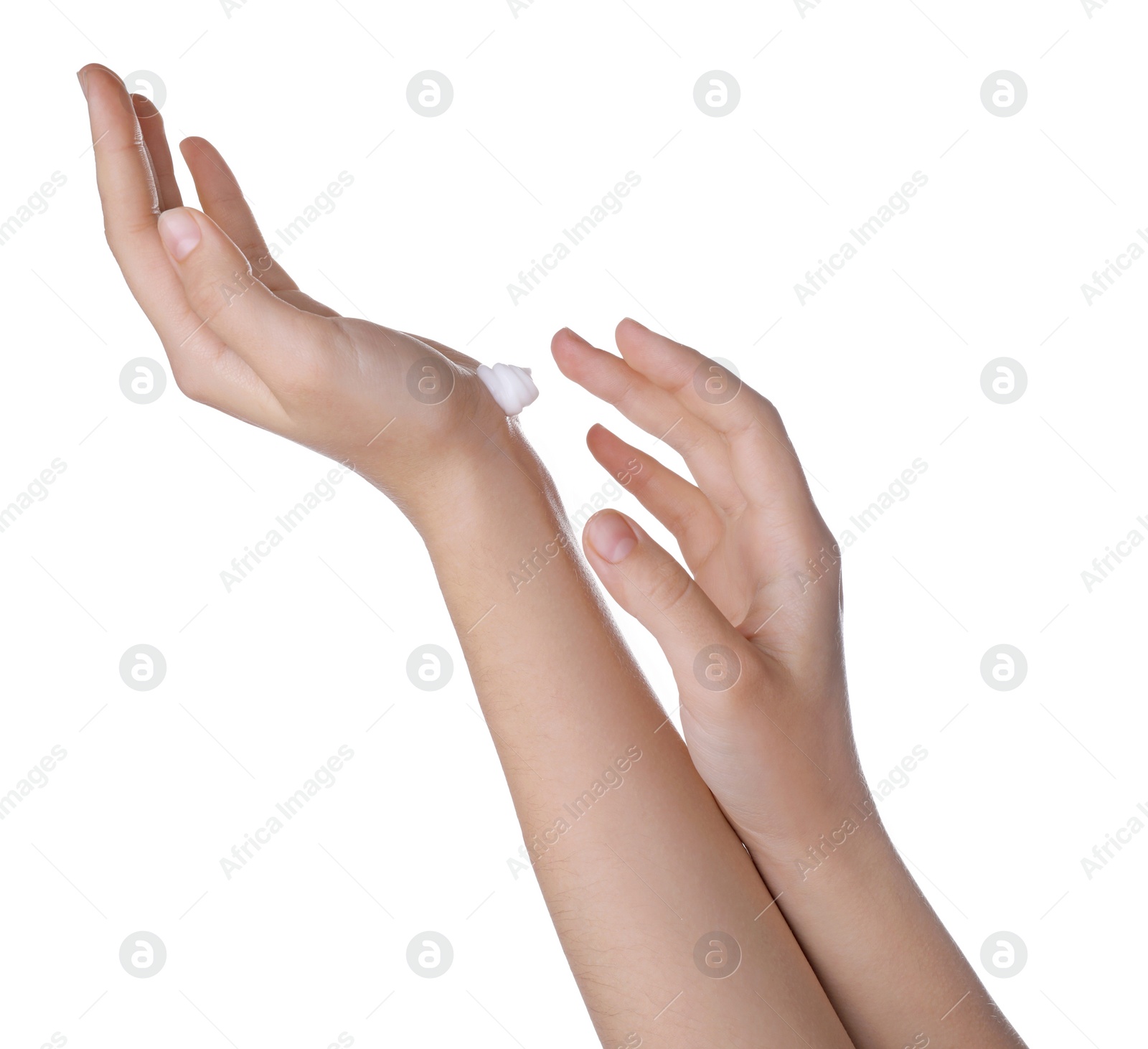 Photo of Young woman applying hand cream isolated on white, closeup