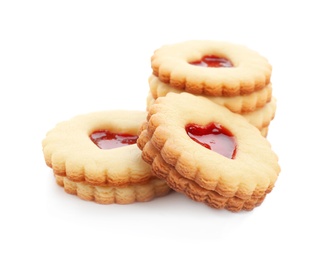 Traditional Christmas Linzer cookies with sweet jam on white background