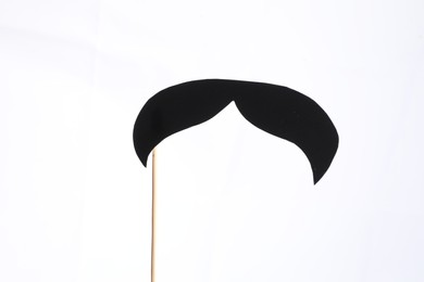 Photo of Fake paper mustache party prop against white background