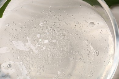 Photo of Natural aloe gel as background, closeup view