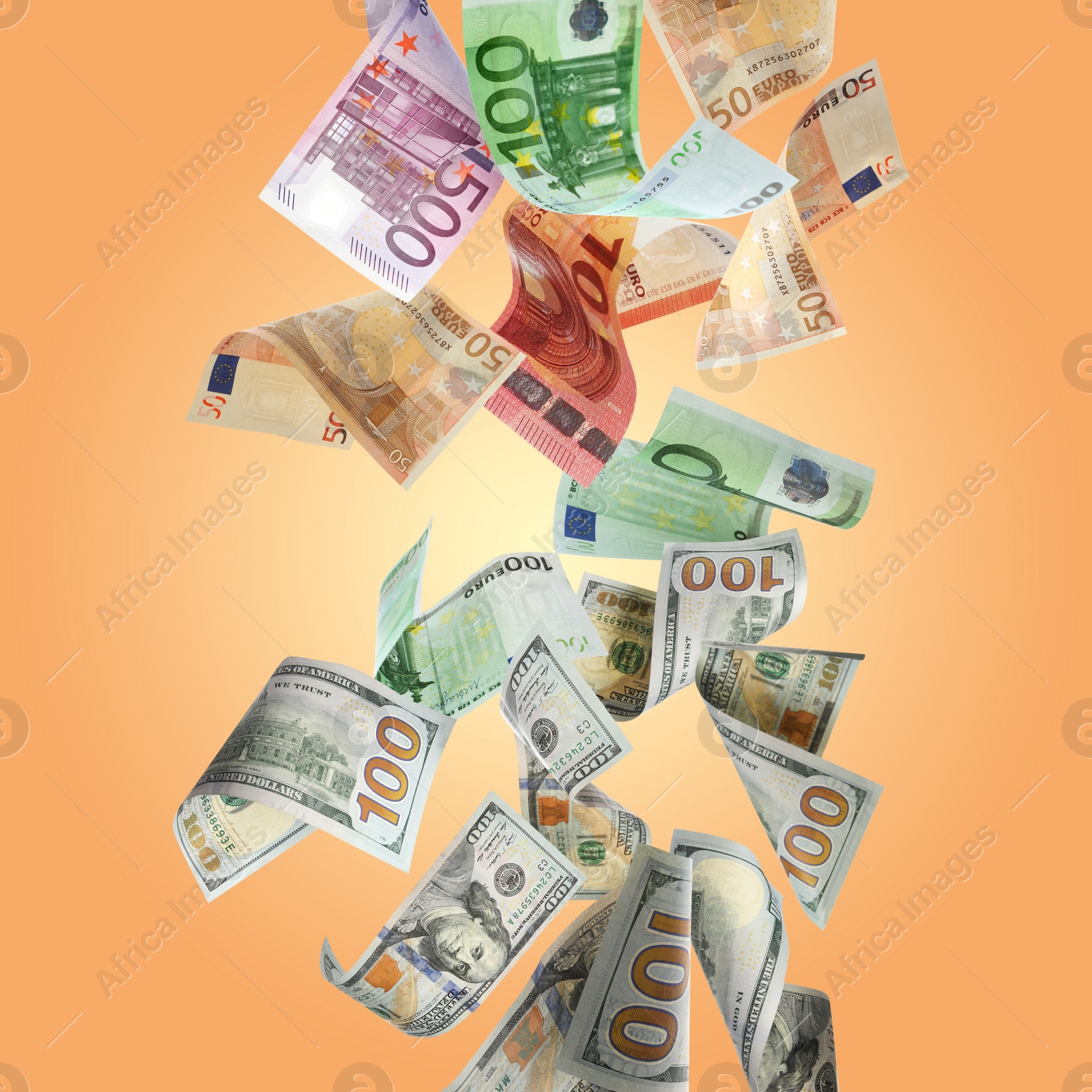 Image of Money exchange. Many dollars and euro banknotes falling on pale orange background