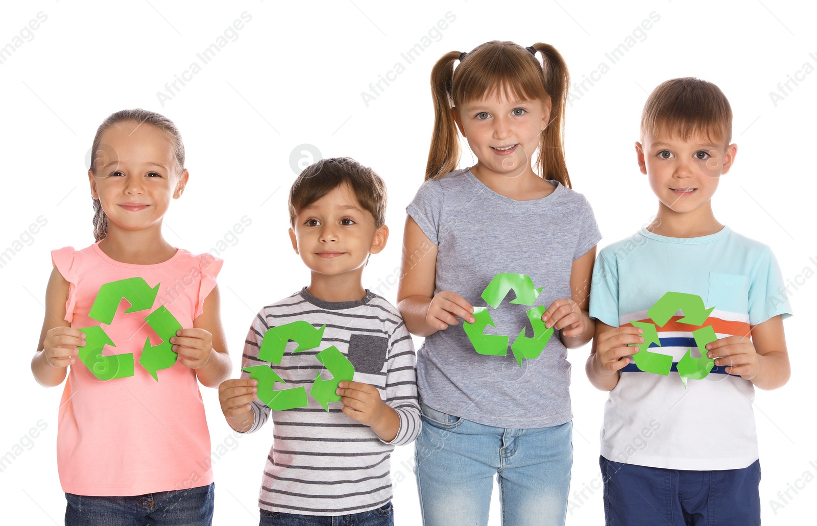 Photo of Little children with recycling symbols on white background