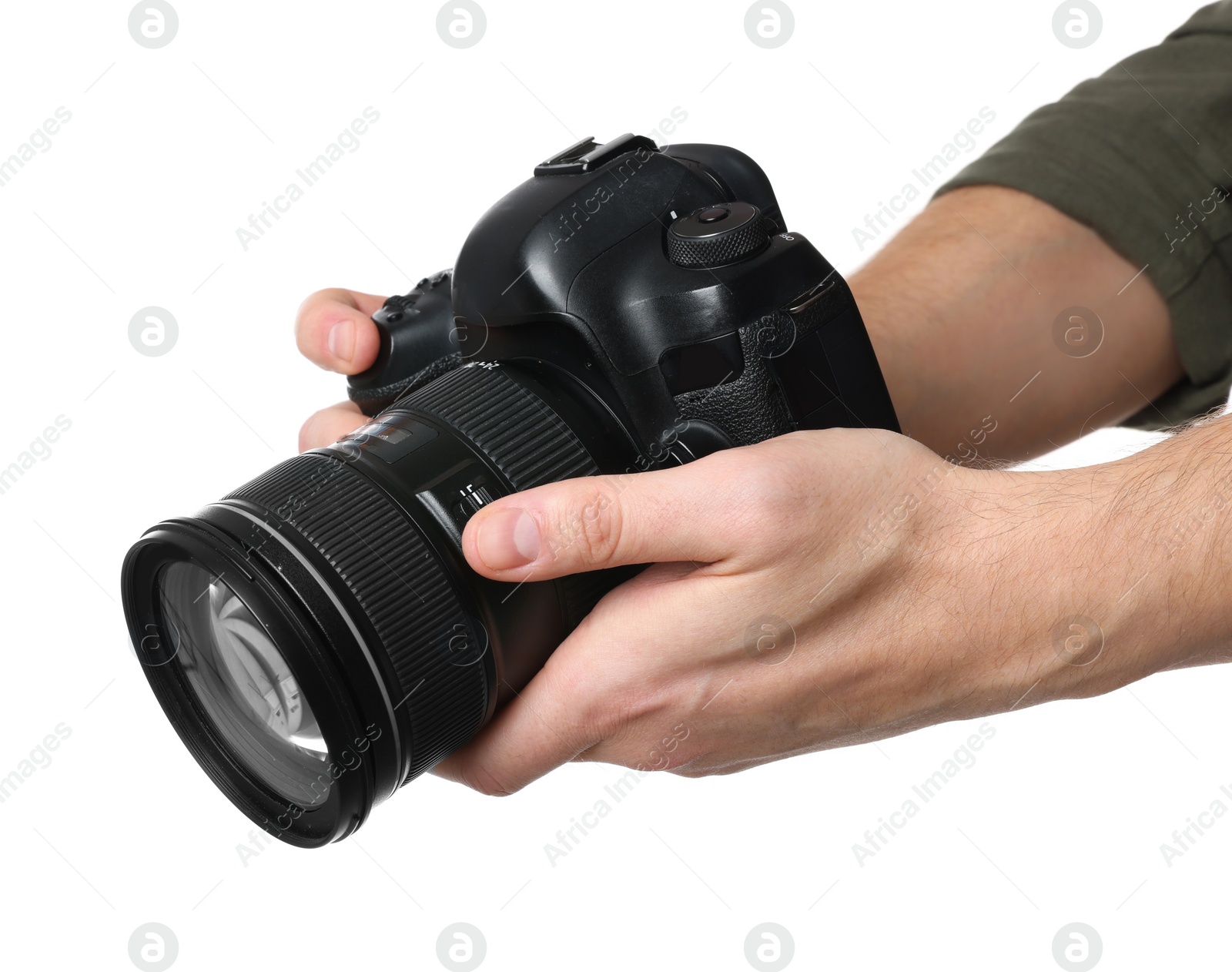 Photo of Photographer holding modern camera on white background, closeup