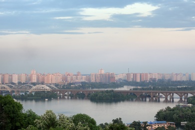 KYIV, UKRAINE - MAY 23, 2019: Beautiful view of Darnitsky railway bridge over Dnipro river