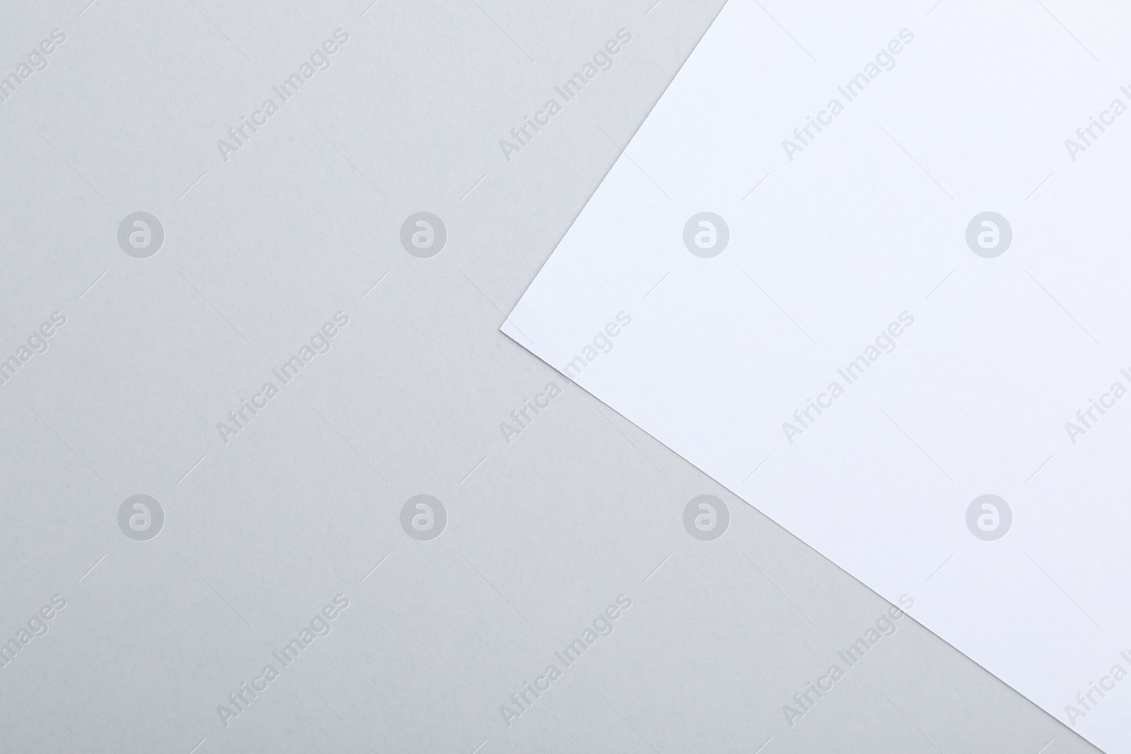 Photo of Colorful paper sheets as background, top view