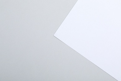 Photo of Colorful paper sheets as background, top view