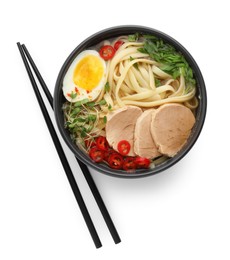 Delicious ramen with meat in bowl and chopsticks isolated on white, top view. Noodle soup