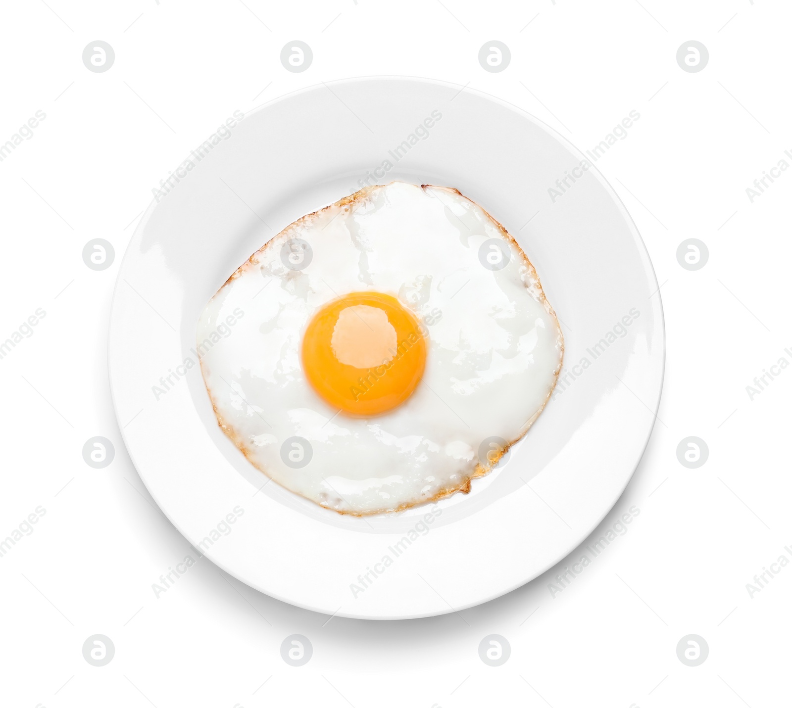 Photo of Plate with delicious fried egg isolated on white, top view