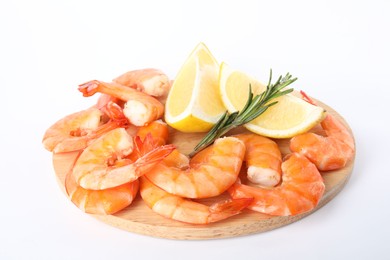 Photo of Delicious cooked shrimps served with lemon and rosemary on white background