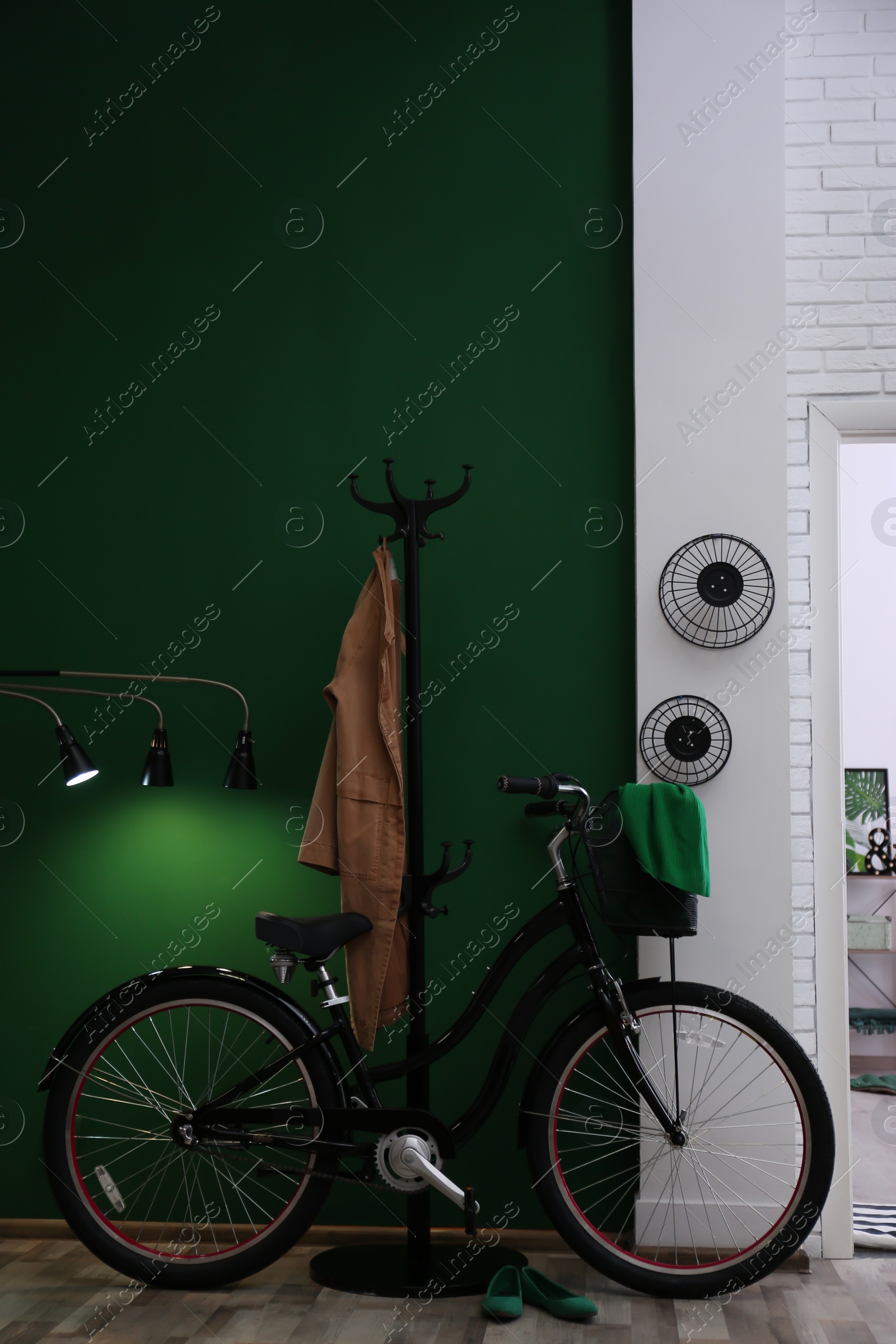 Photo of Stylish hallway with modern bicycle. Idea for interior decor