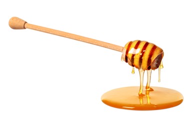 Image of Natural honey dripping from dipper on white background