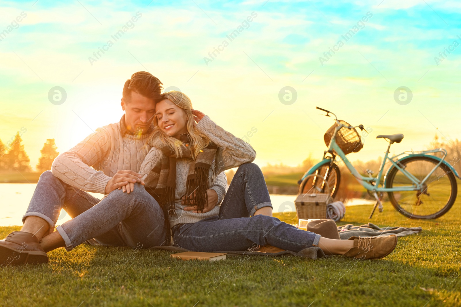 Photo of Happy young couple spending time together on picnic outdoors