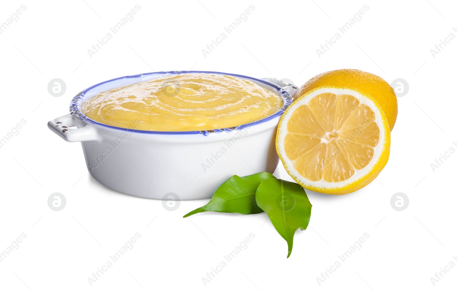 Photo of Delicious lemon curd in bowl, fresh citrus fruits and green leaves isolated on white