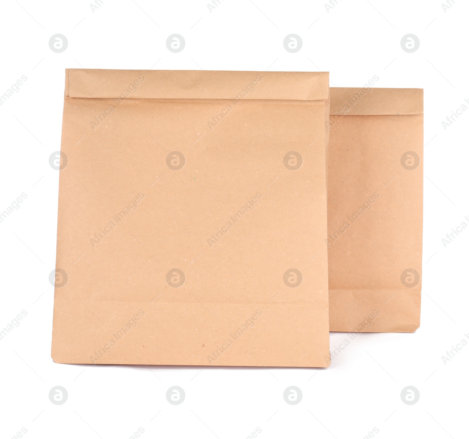 Photo of Paper bags isolated on white. Mockup for design