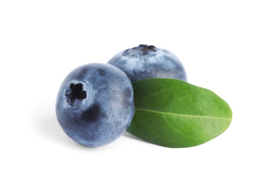 Fresh ripe blueberries with leaf on white background