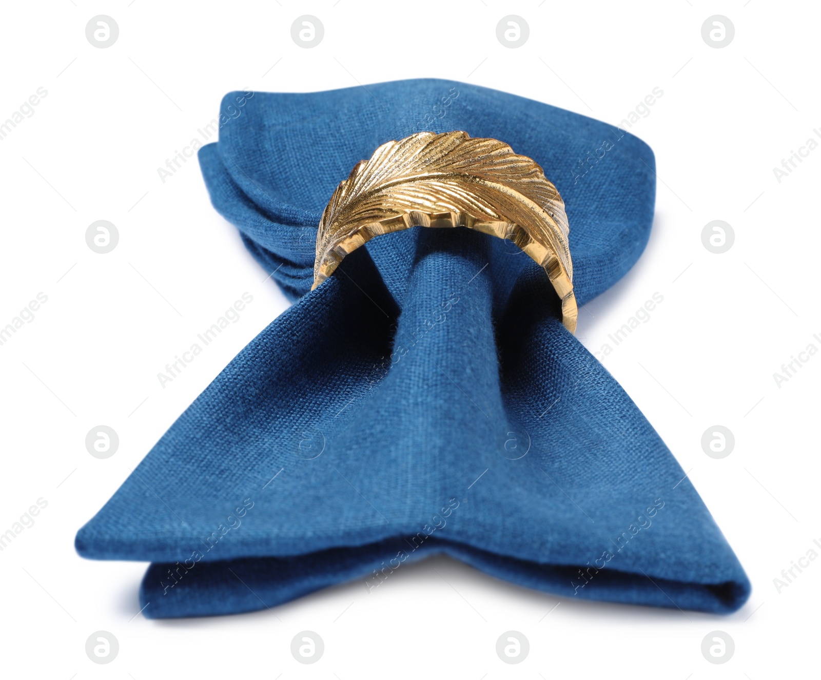 Photo of Blue fabric napkin with decorative ring for table setting on white background