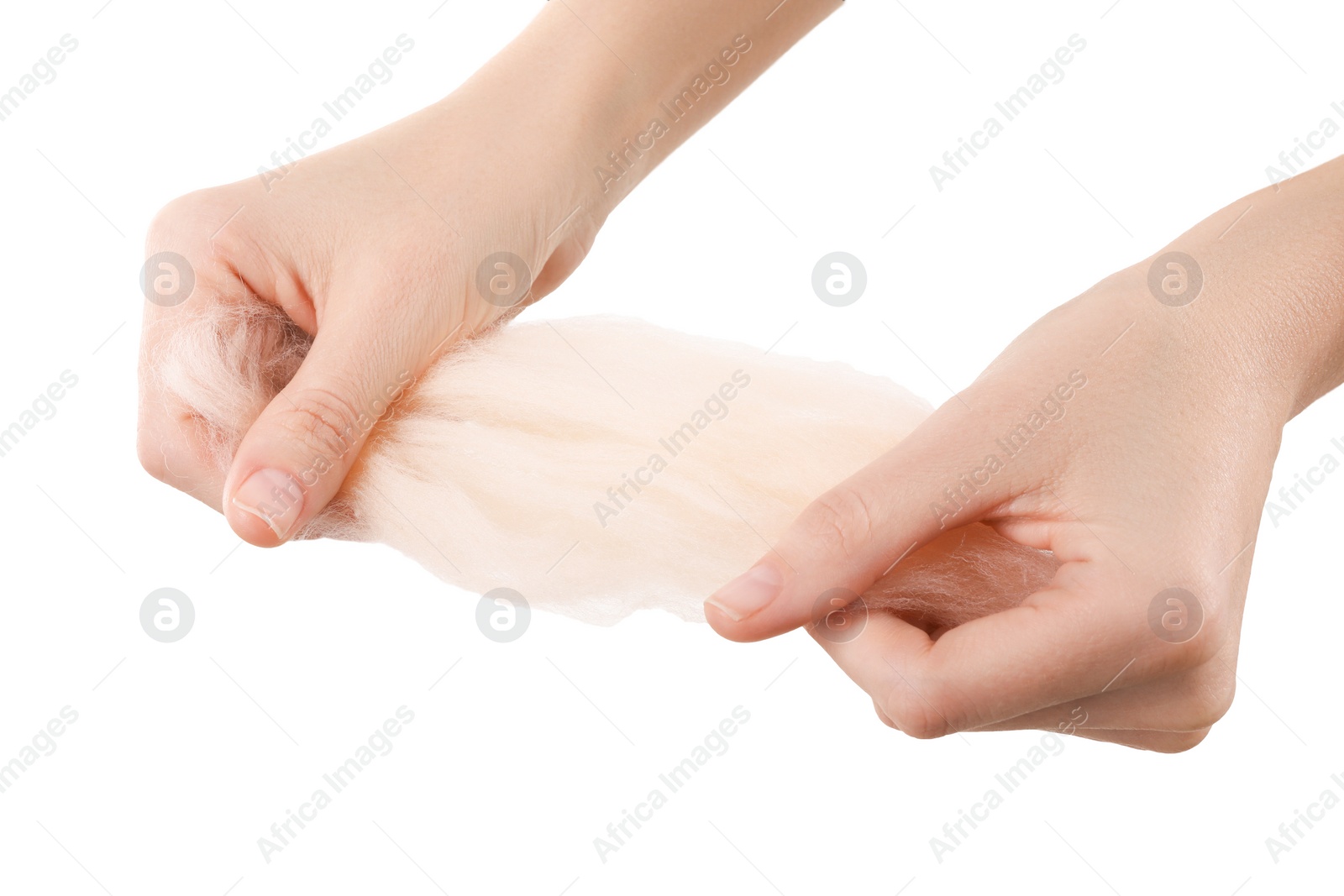 Photo of Woman holding beige felting wool on white background, closeup